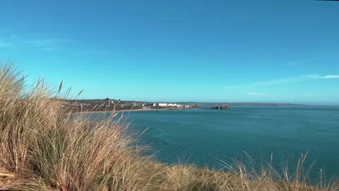 View from Giltar Point back towards Tenby South Beach Stock Footage 235929063