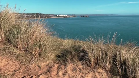 View from Giltar Point back towards Tenby South Beach Stock Footage 235929068