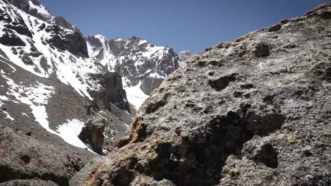 View of the glacial mountains because of the large stone Stock-Footage 103967194