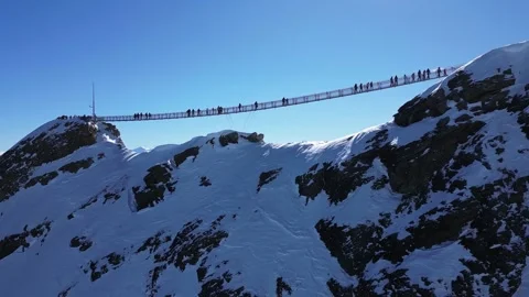 View of Glacier 3000 with Alpine Peaks, Suspended Bridge (Peak Walk) Stock Footage 303465983