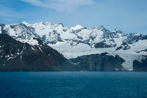 View of glacier and mountain range Stock Photos