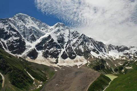 View on the glacier called Seven with green lake Stock Photos