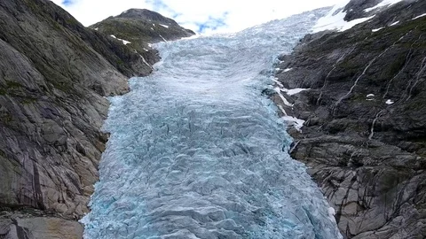 A view of the glacier located between the two mountains. Jostedalsbreen. Norway Vídeos de archivo 81569375