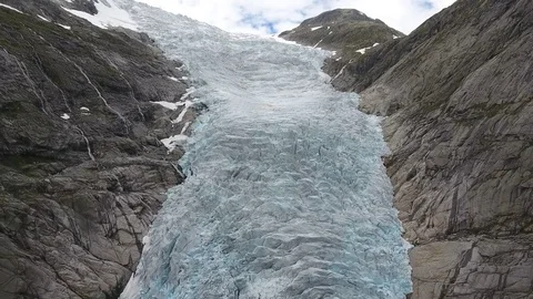 A view of the glacier located between the two mountains. Jostedalsbreen. Norway Vídeos de archivo 81569487