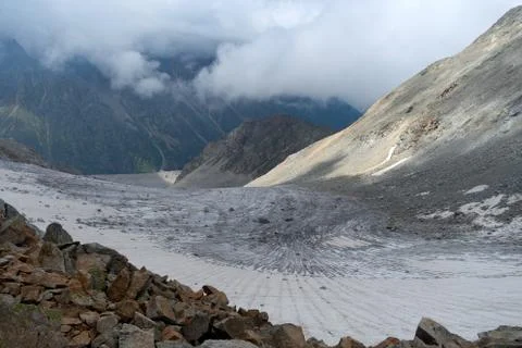 View of the glacier from the mountain pass. Stock Photos