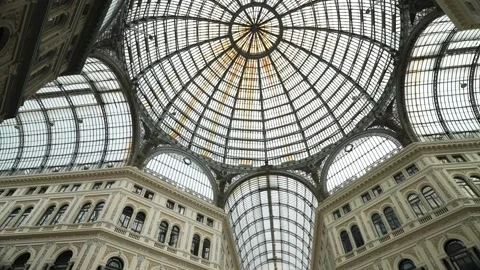 View of the glass ceiling of the historic Royal shopping Arcade Galleria Umberto Stock Footage 263767146