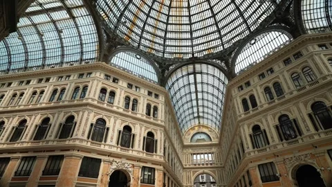 View of the glass ceiling of the historic Royal shopping Arcade Galleria Umberto Stock Footage 269668676