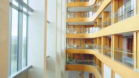 View from the glass elevator cabin rising in a modern Minsk Marriott Hotel Stock Footage 315914850
