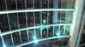View from glass elevator at night, Dubai, United Arab Emirates. Lift rises HD Footage