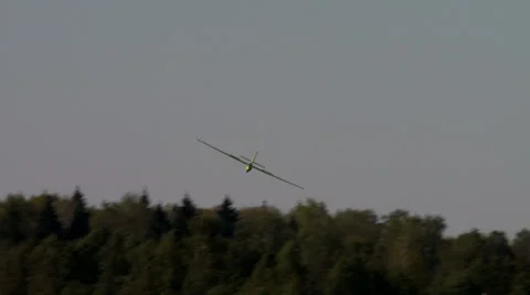 View of glider landing on forest background Stock Footage 61073483
