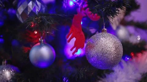 View of glowing Christmas tree lights in vibrant colors Stock Footage 303068528