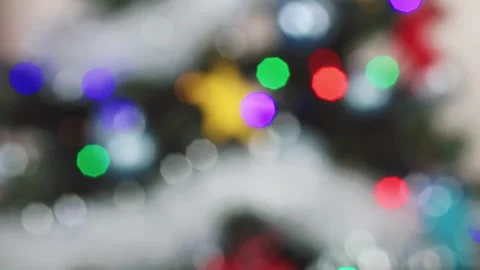 View of glowing Christmas tree lights in vibrant colors Stock Footage 303072072