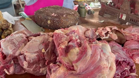 View of goat, beef, and chicken meat sold at the traditional market Stock Footage 322787238
