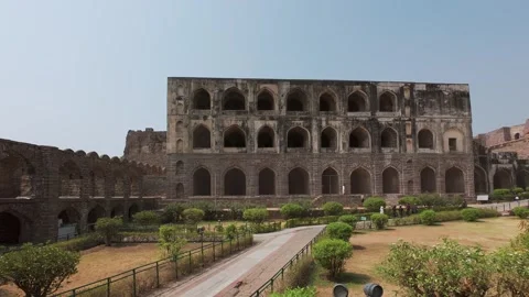 View of Golconda fort with visitors viewing the architecture of the landmark Stock Footage 285773801