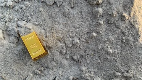 View of gold bars and sandy soil background, Stock Photos
