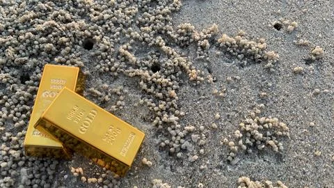 View of gold bars and sandy soil background, Stock Photos