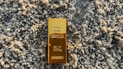 View of gold bars and sandy soil background, Stock Photos