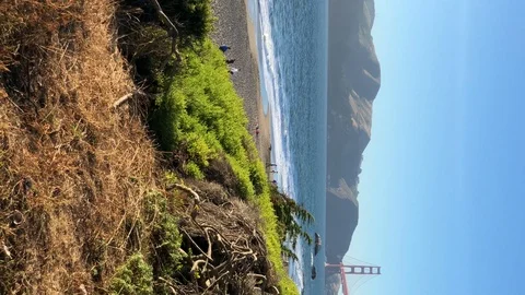 View of Golden Gate from Baker Beach in San Francisco. Vertical Stock Footage 124745032
