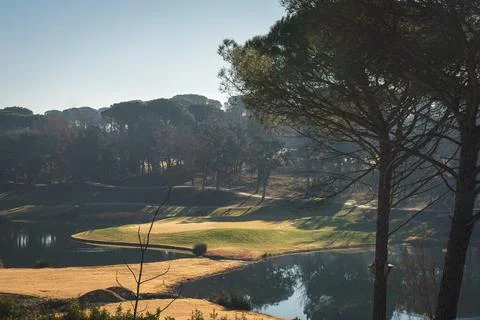 View of a golf course from afar in dry season Foto stock