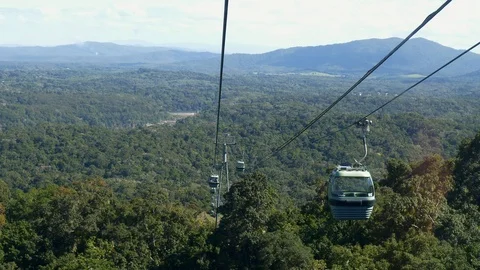 View of gondolas moving on the Skyrail cableway in Cairns Australia Stock Footage 93969570