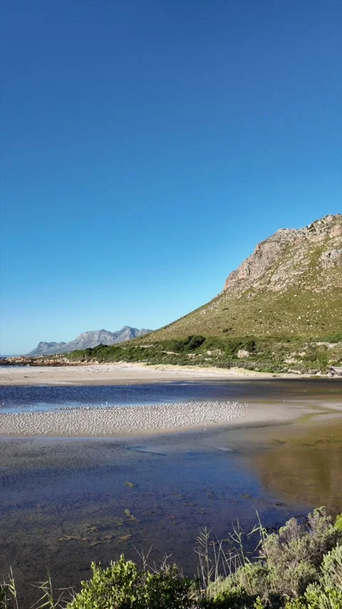 View of the gorgeous Rooi Els beach and estuary Stock Footage 306770117