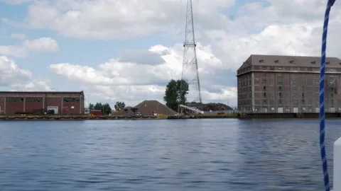View Of Grain Terminal With Elevator On Nowy Port From A Boat Cruising On Stock Footage 190451863