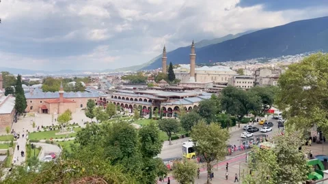 View to Grand Mosque of Bursa and historic cityscape with mountains in Turkey Stock Footage 346149200