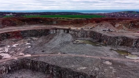 View of granite quarry from above showing excavation work in progress Stock Footage 337937600