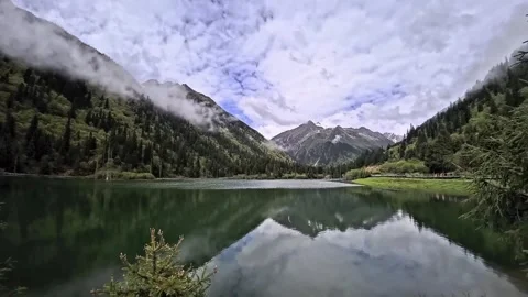 View of green-colored Dagu Lake during a summer morning Stock Footage 340704956