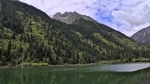 View of green-colored Dagu Lake during a summer morning Stock Footage 340705093