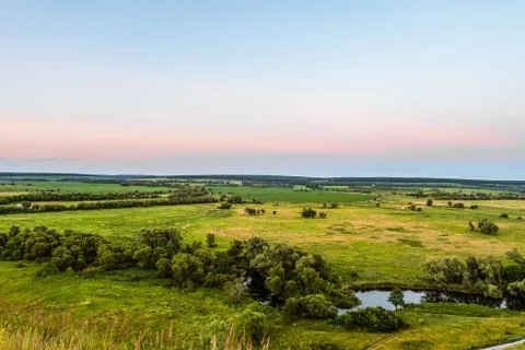 View of green forest-steppe plain. River Koren (Root) valley. Stock Photos