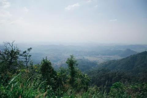 View of green mountain under mist and sky cloudy , Umphang Tak Thailand Stock Photos