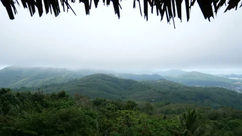 View of green mountains with white mist after rain. 動画素材 135871682