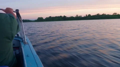 View of green shore with trees. View from motor boat floating on river at high 스톡 동영상 143834727