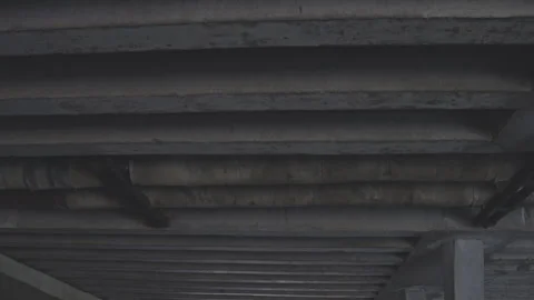 View of grey stone bridge elegant structure from beneath Stock Footage 260702624