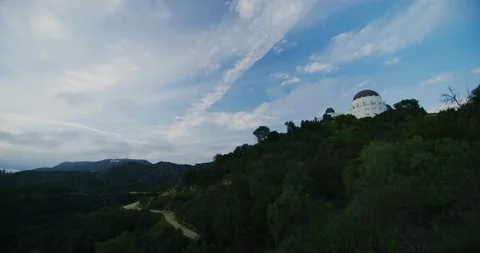 View of Griffith Park Observatory and Hollywood sign in Los Angeles, California Stock Footage 115071332