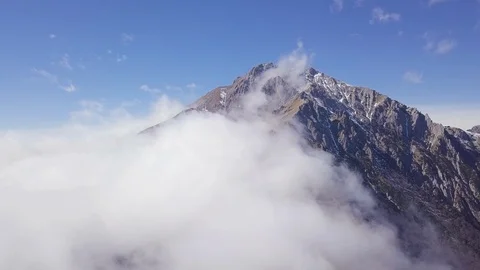 The view of Grigna Meridionale above the clouds, Lecco, Lombardy, Italy Stock Footage 116143976