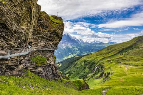 View of Grindelwald First. Popular tourist attraction cliff walk at the Gri.. Stock Photos