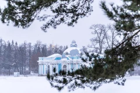 A view of Grotto from behind of tree branches Stock Photos