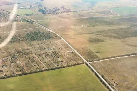 View of the ground from the airplane window. Photos