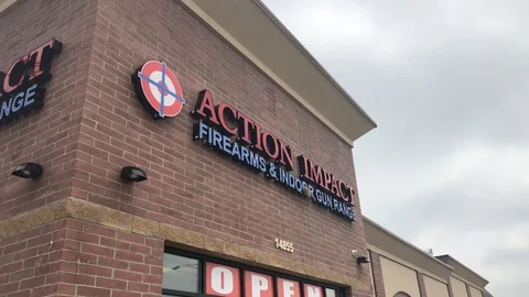 View of a gun store and training center in Detroit Video stock 95491035