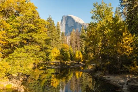 View of the Half Dome and the Merced River from the Sentinel Bridge in Yosemite Stock Photos