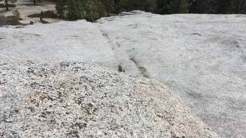 View of Half Dome from Sentinel Dome in Yosemite National Park Camera Tilt Stock-Footage 90265795