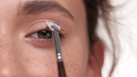 View half face of beautiful brunette hair female with nude make look at the Stock-Footage 166378427