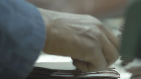 View of a hand counting stump leather Stock Footage 107964611