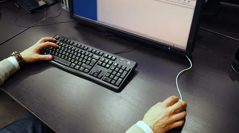  View to hand of a employee open and edit spreadsheet on LCD monitor Video stock 67226429