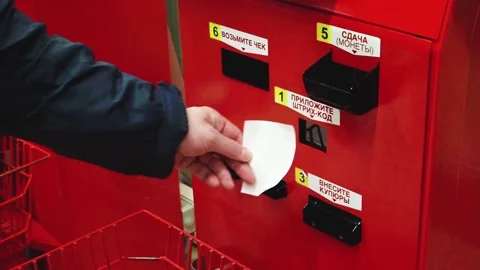 View of hand of man scanning barcode on receipt at selfservice checkout in store Stock Footage 151101083