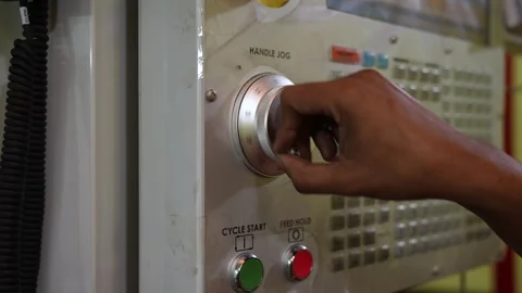 View of a hand operating a CNC machine control panel, Bangladesh. Video stock 334950615