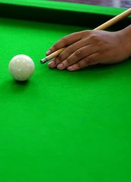 View of Hand of Player playing billiards game Stock Photos