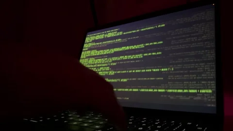 View of hands hacking computer Stock Footage 258075565